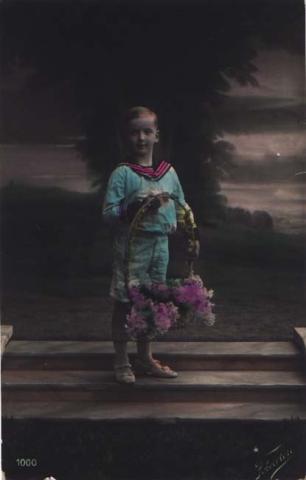 Primera imagen del registro Niño con Canas con Flores