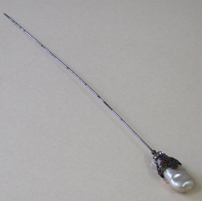 Primera imagen del registro Alfiler de sombrero