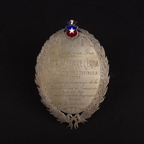 Primera imagen del registro Placa Conmemorativa que pertenecio a Pedro Aguirre Cerda, la fábrica de Sederías