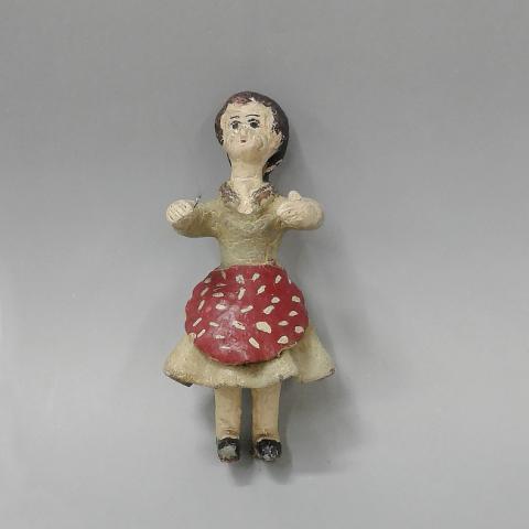 Primera imagen del registro Mujer con delantal rojo