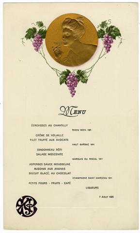 Primera imagen del registro Menú en francés con medalla de mujer y racimos de uva